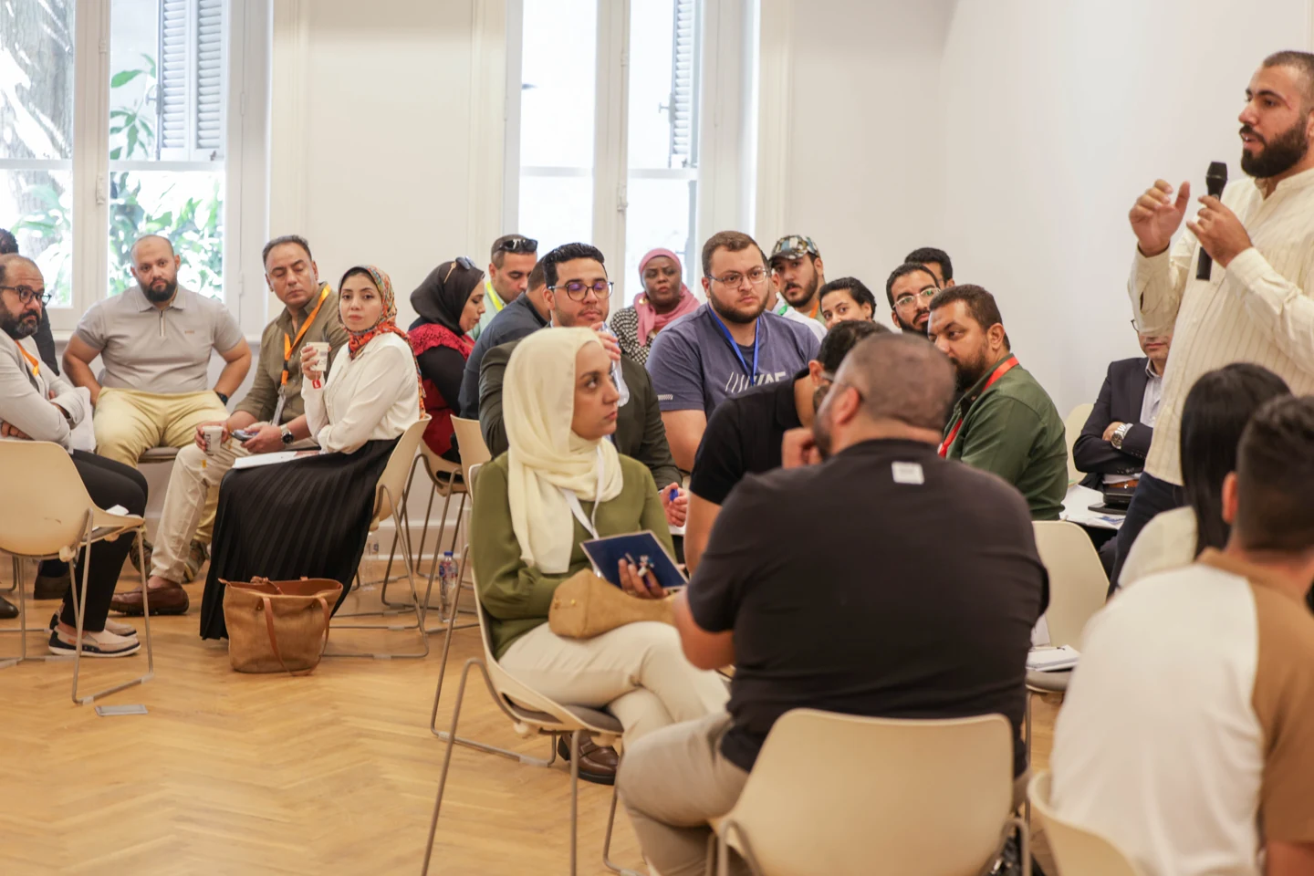 Participants listening and contributing during the supplied company event